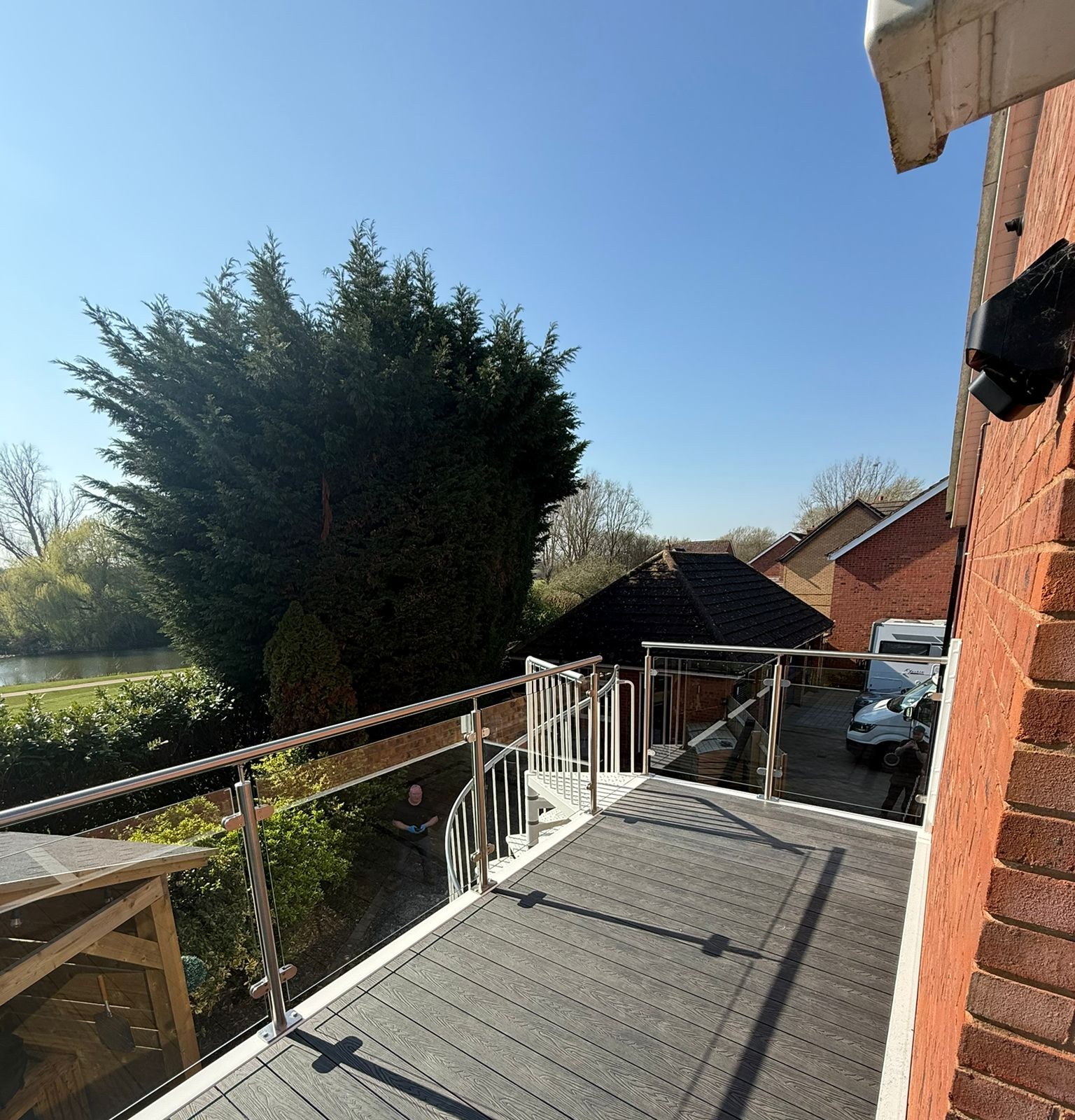 Stainless steel glass balustrade on composite decking balcony, Northampton NN4