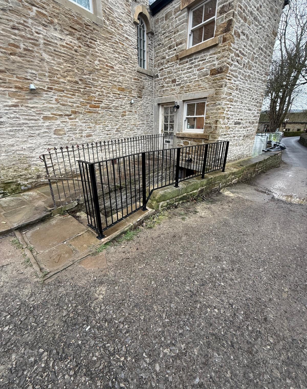 alvanised powder coated steel railings core drill fixed to stone building, Barnsley