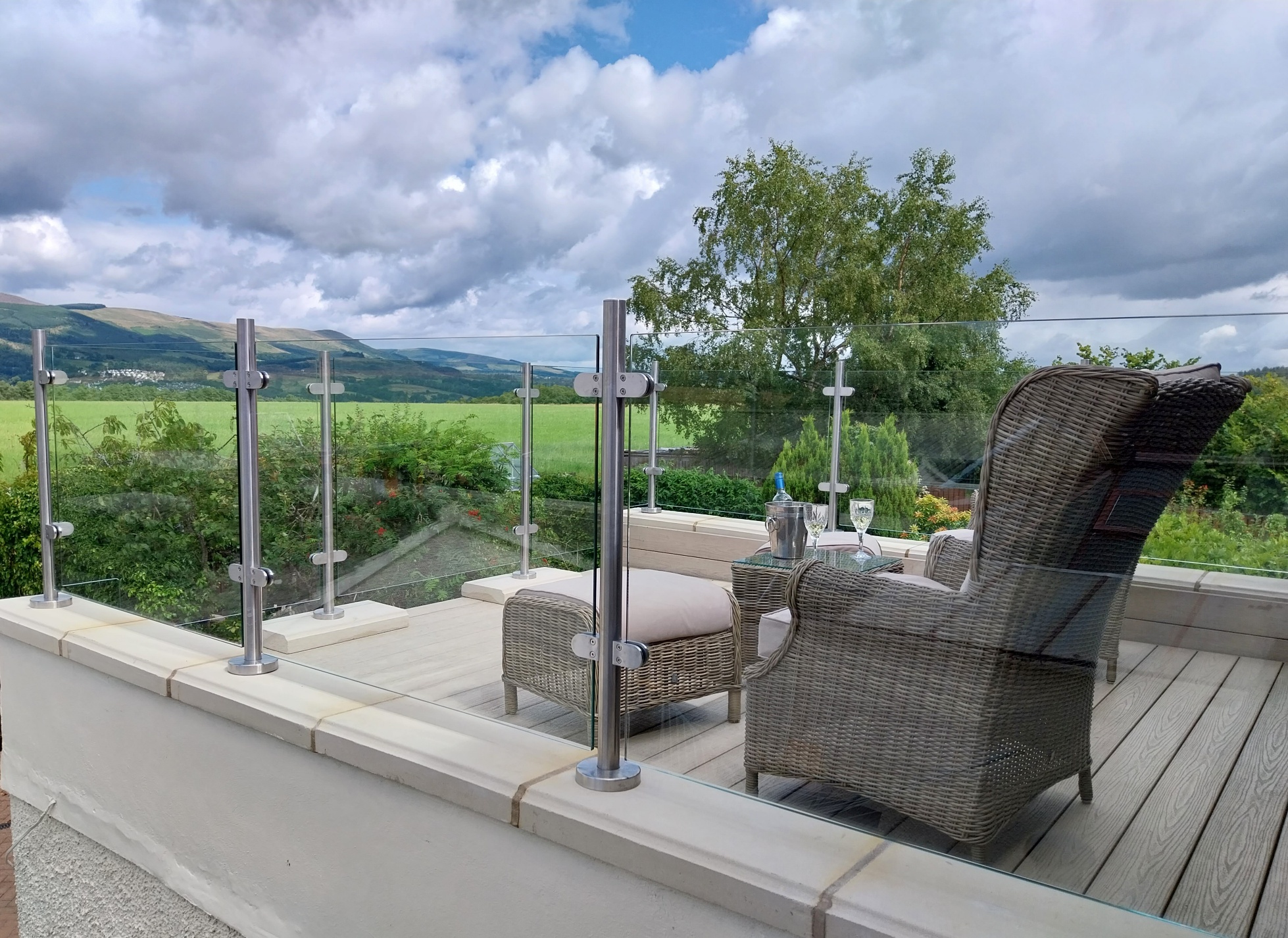 glass wind screen panels to scottish patio