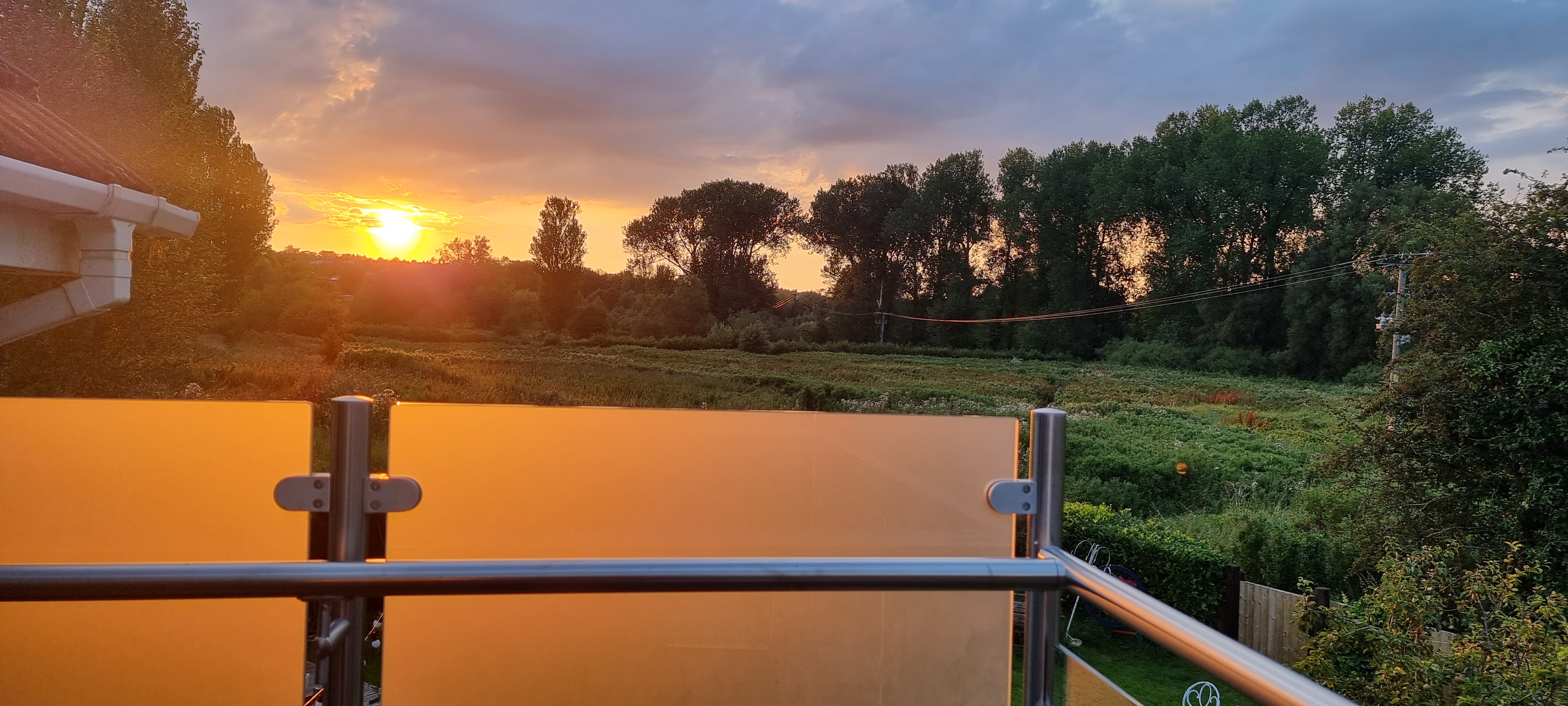 walkout balcony with raised frosted glass privacy screens
