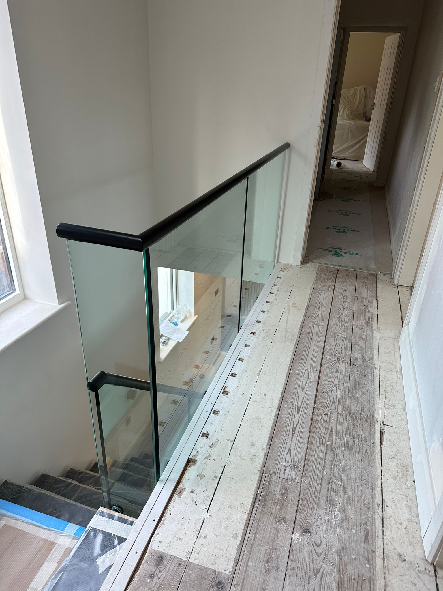 Frameless Glass Stair Landing