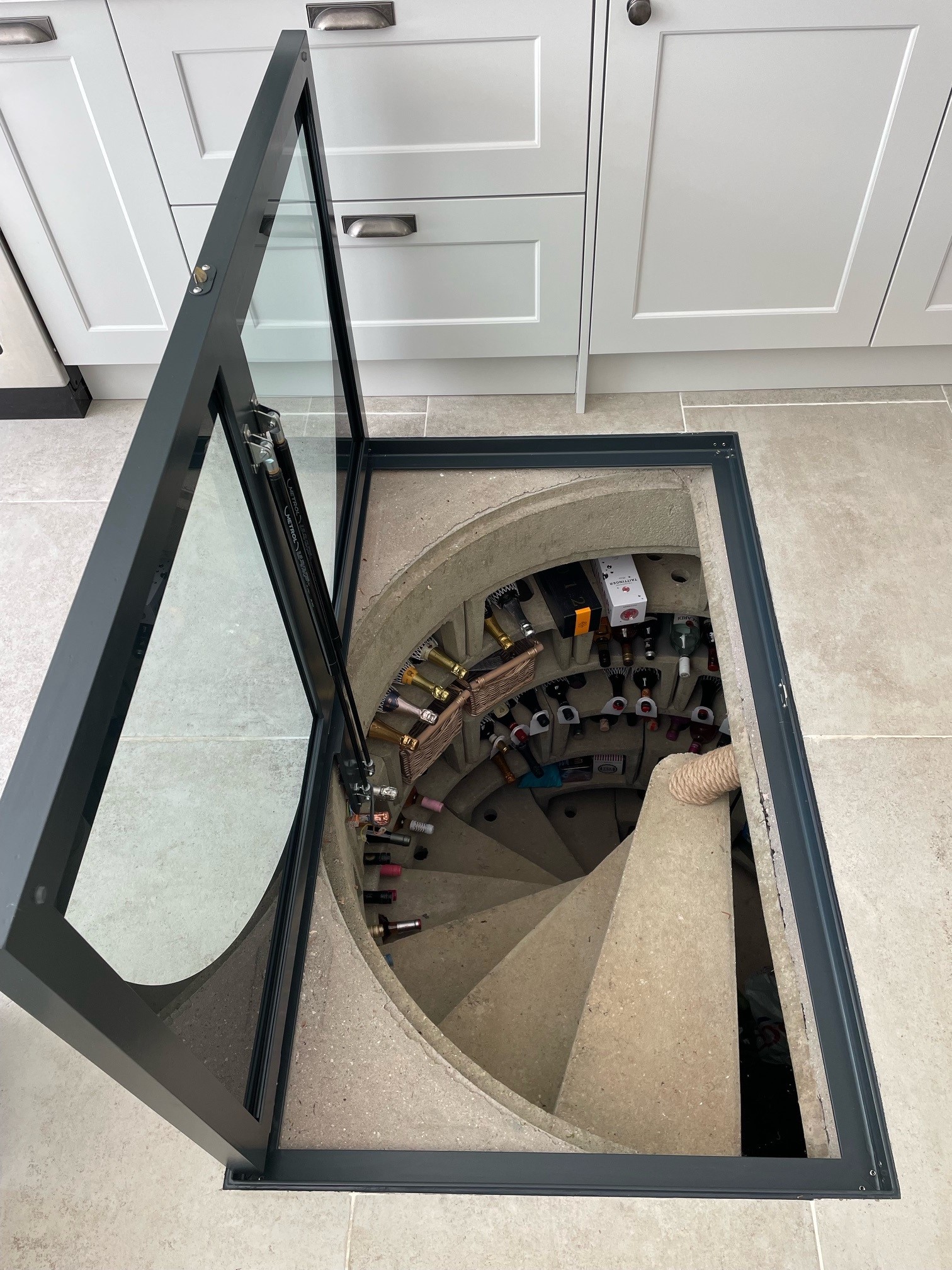 Semi Circular Concrete Wine Cellar Glass Door