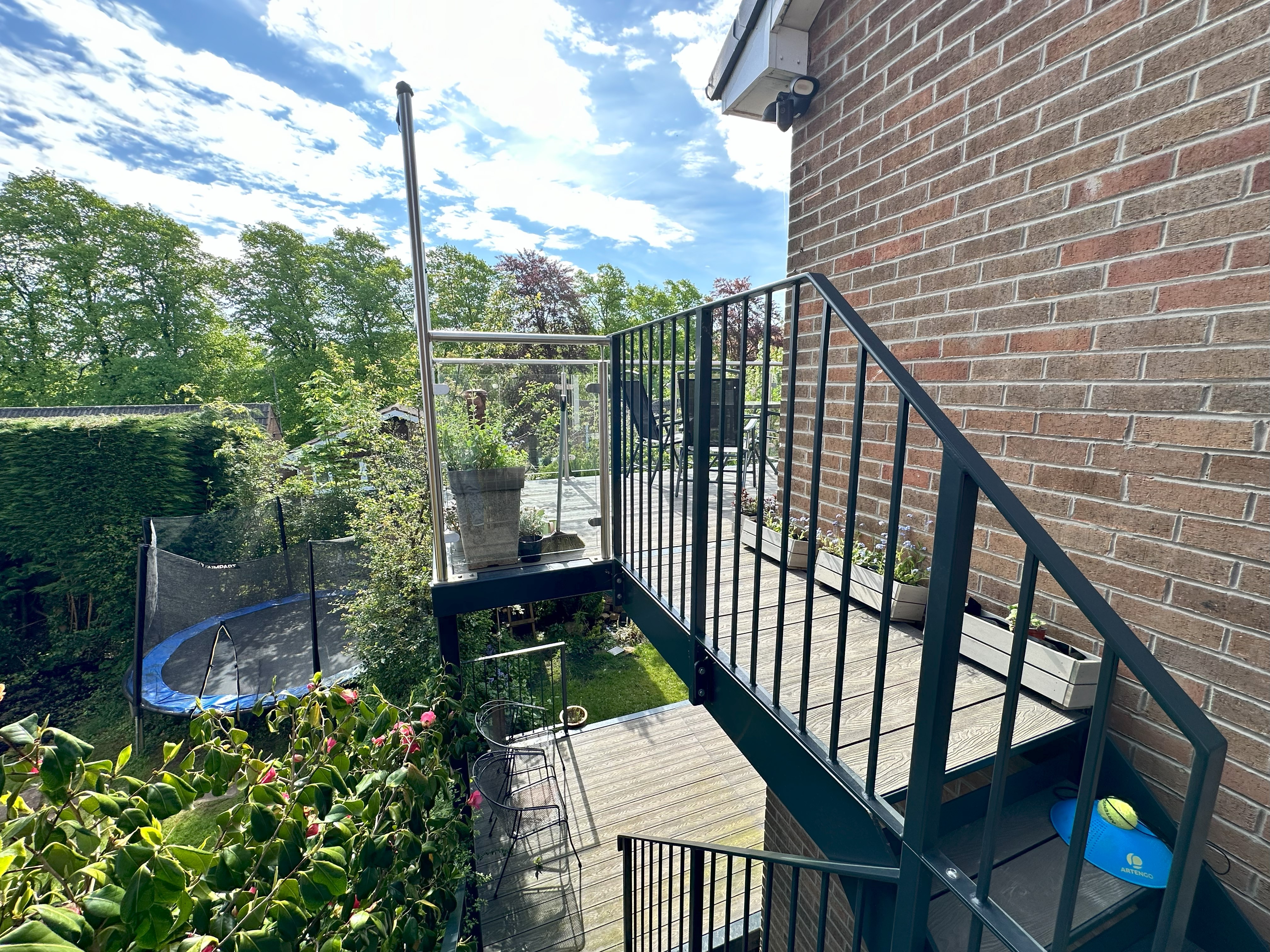 Dual Height Walkout Balcony and Staircase