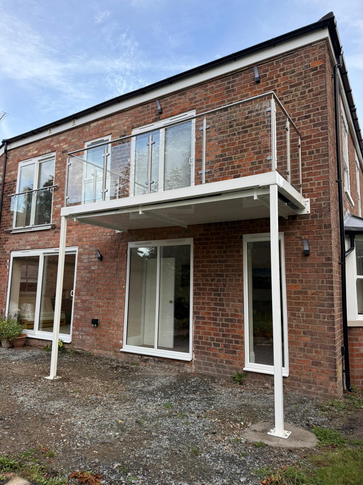 powdercoated white walkout balcony and juliet