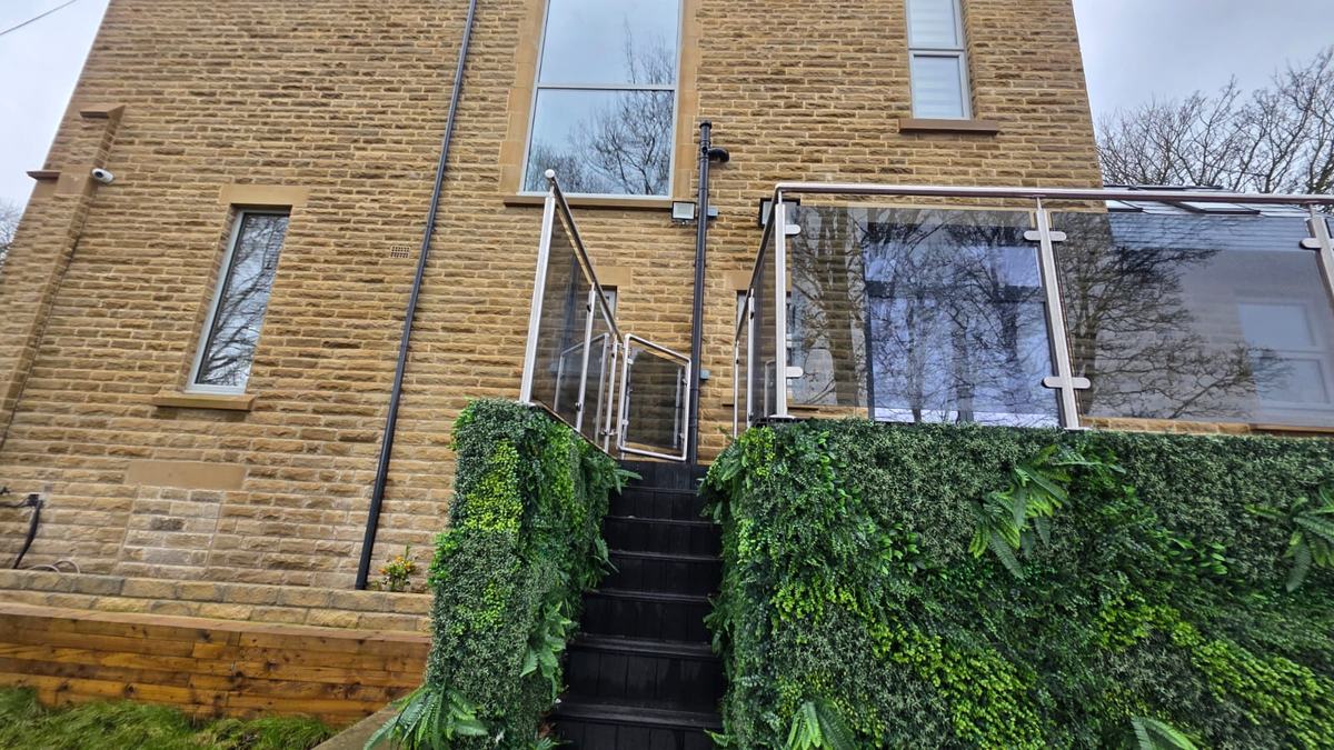 Lockable glass gate at the head of the deck steps, tinted glass balustrade, Barnsley