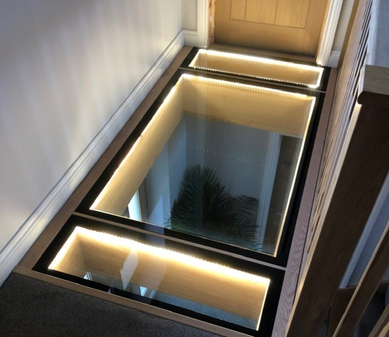 25mm walk-on floor glass panel set flush into an internal floor