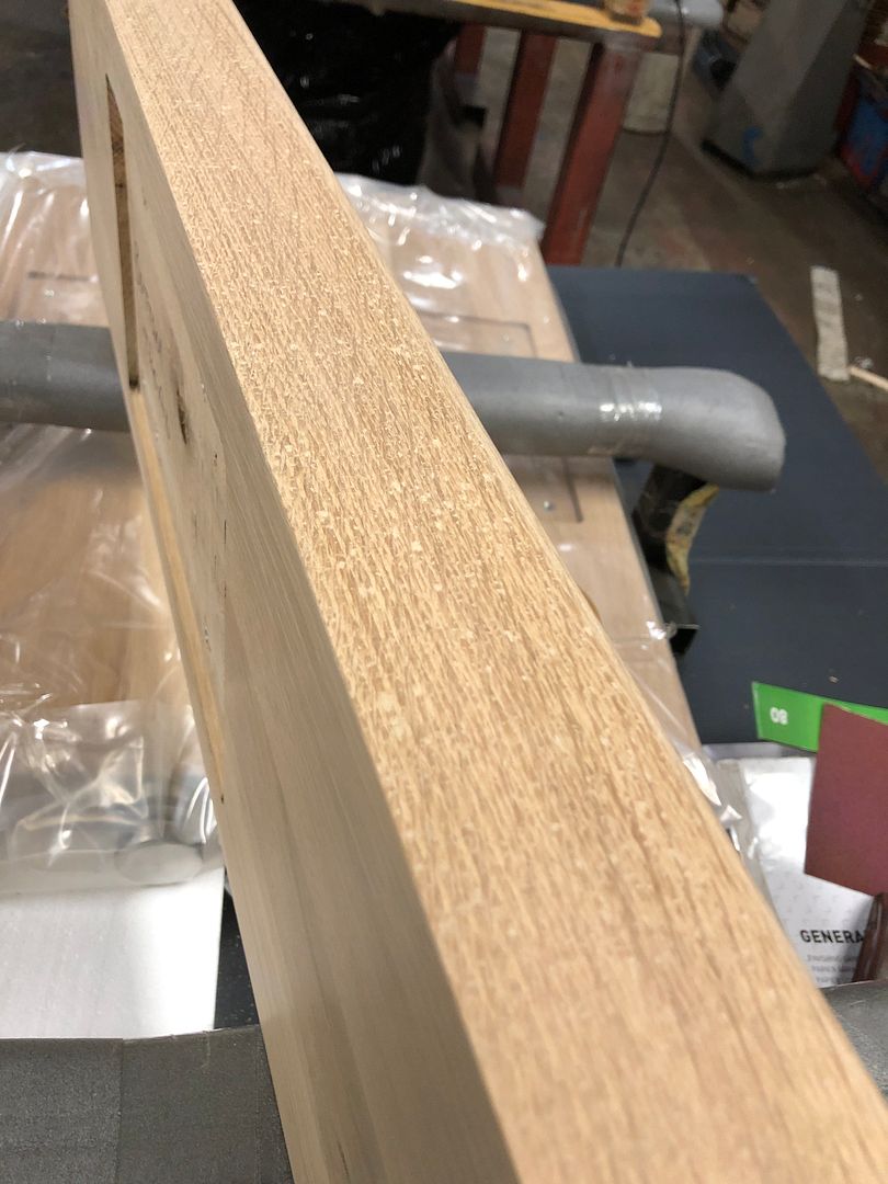 Close-up of natural cracking in a hardwood stair tread, normal in solid timber
