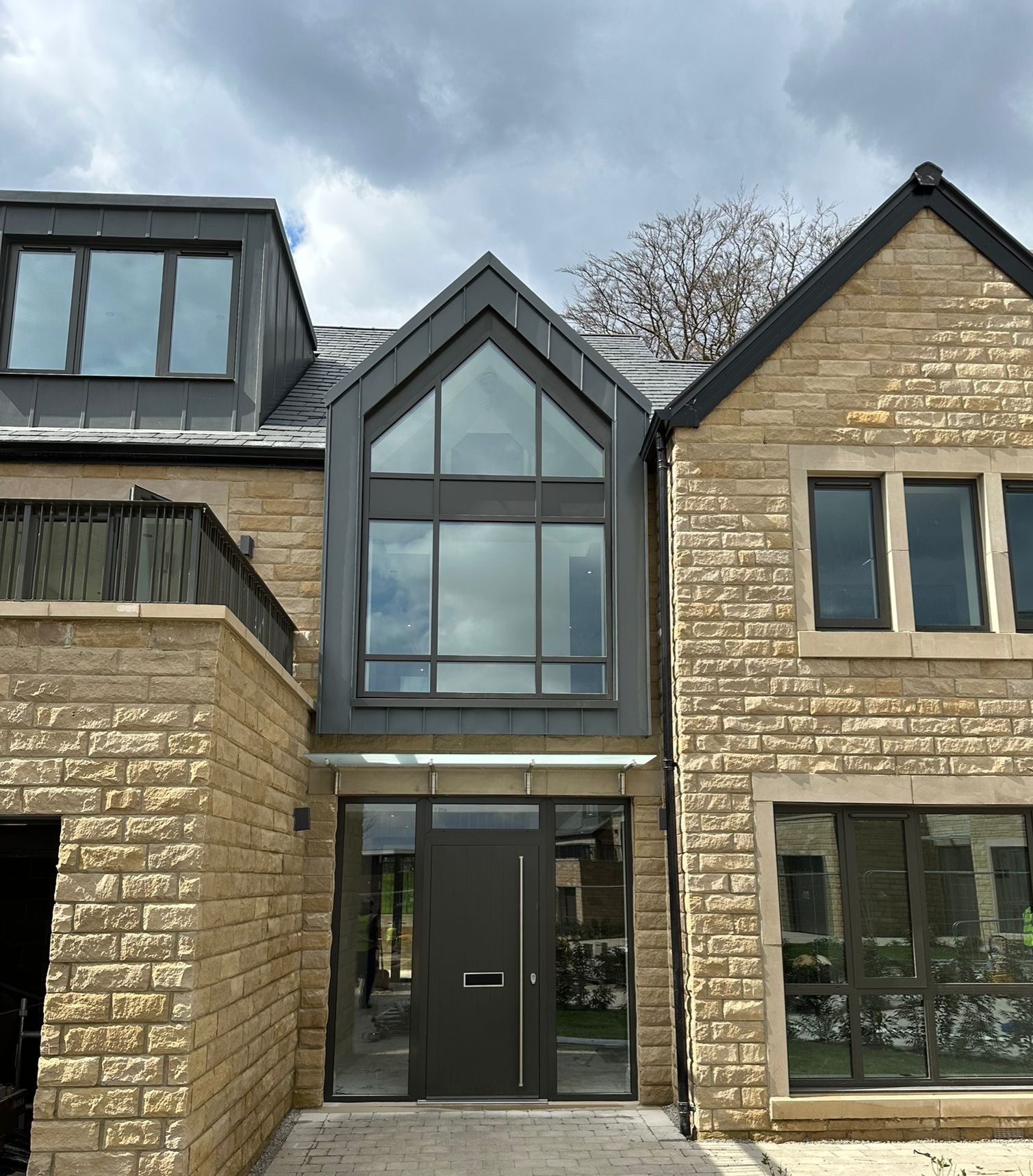 Frosted glass door canopy installed on stone built executive property, Hallam Mews development, Ranmoor Sheffield