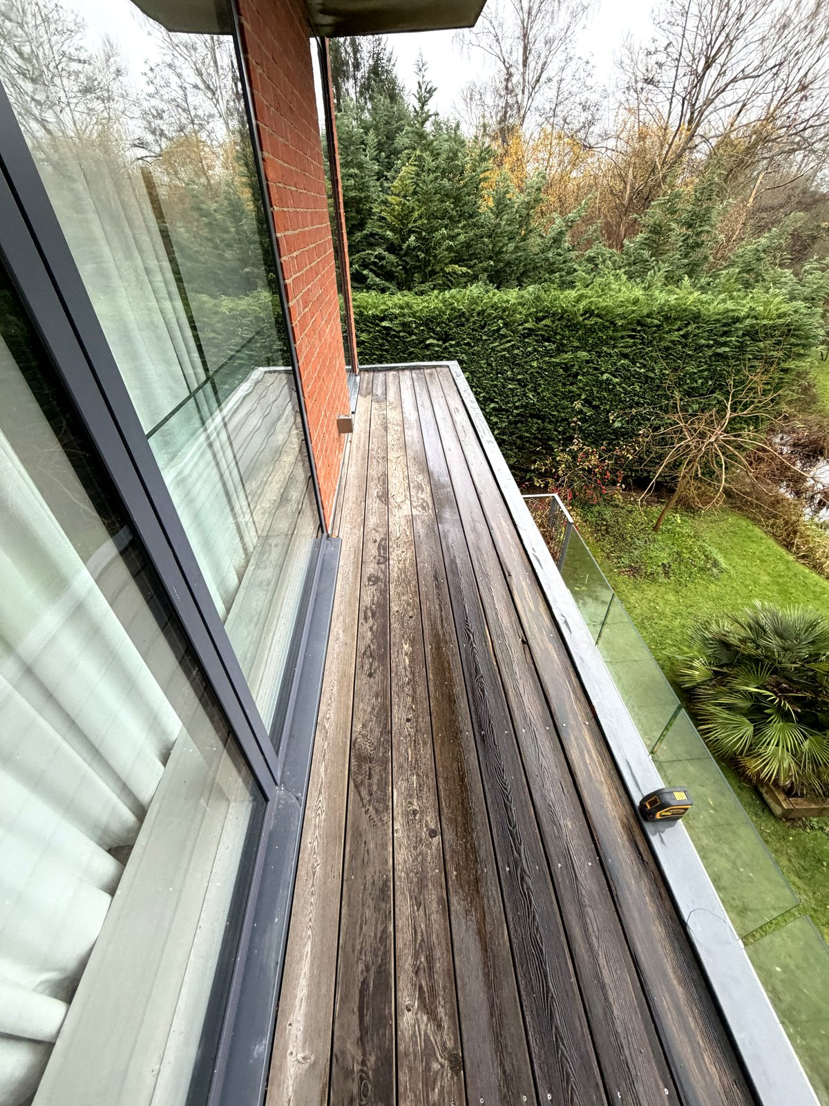 A tired timber-decked balcony before replacement, Bourne End, Buckinghamshire